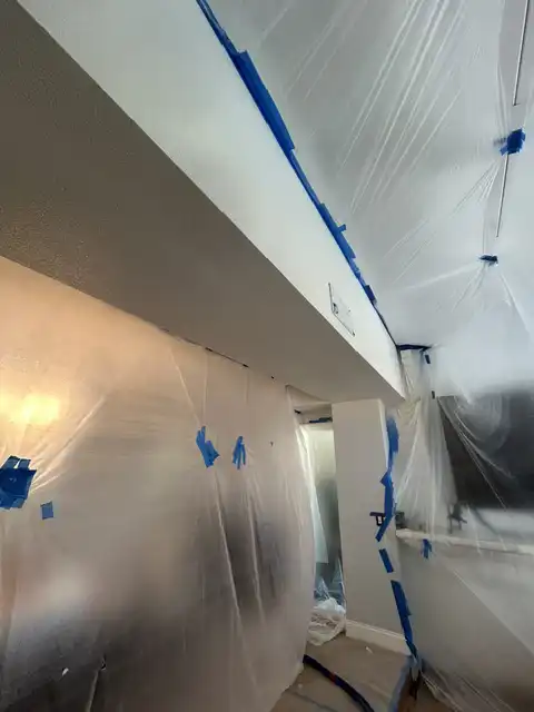 Small soffit water damage repair. Finish items protection, Demolition, drywall hanging, taping, corners application, matching existing texture and clean up. 2026 project photo
